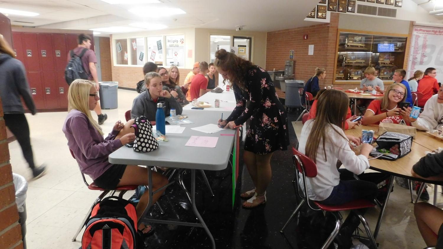 Students signing up for clubs 