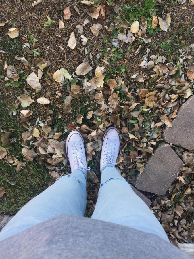 Looking down at my outfit and the leaves