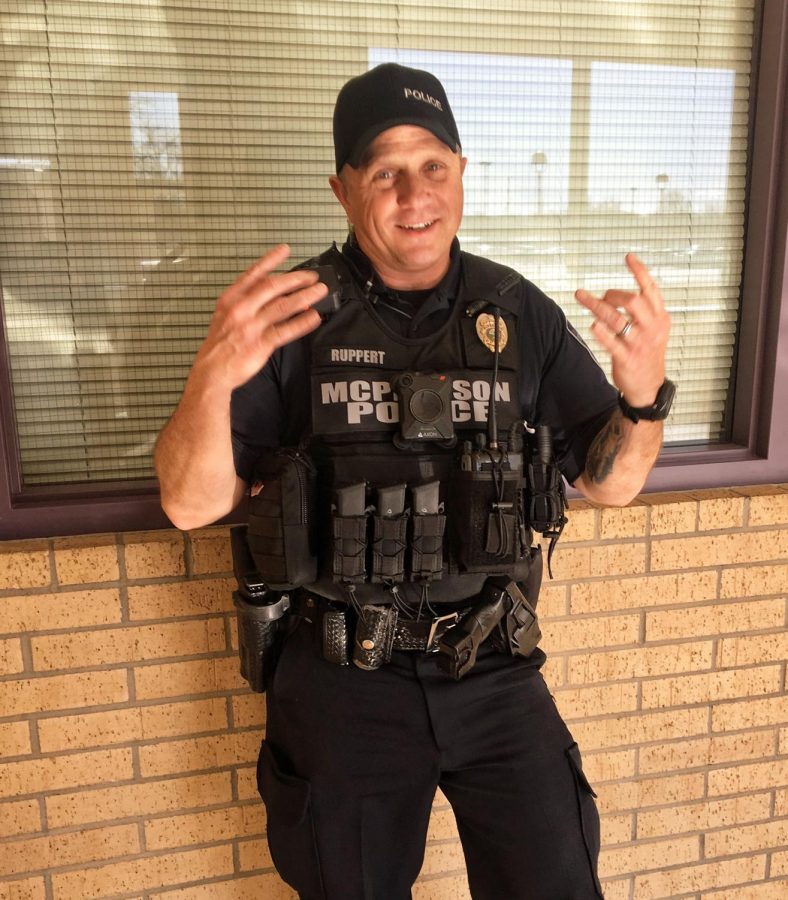 The resource officer at McPherson High School, Joey Rupert, posing his trendiest pose. 