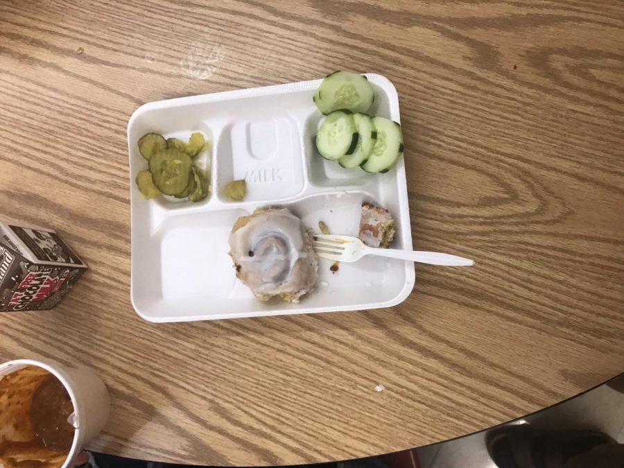 cinnamon roll and pickles with cucumbers  