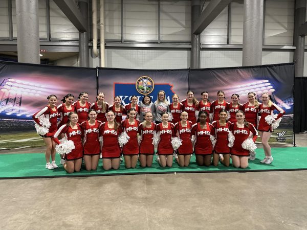 Leading the team: The inspiring journey of McPherson High Schools cheer coach!