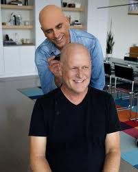 John Stamos helping Dave Coulier shave his head because of stage 3 cancer.