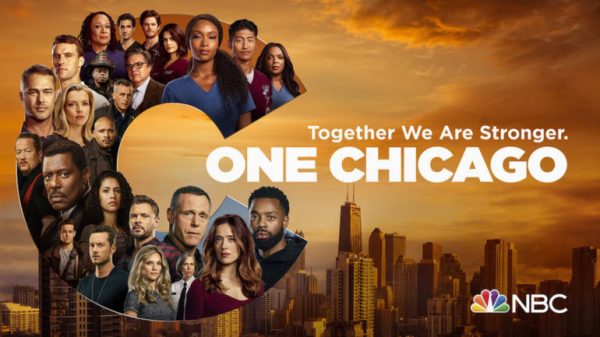 A poster showing most of the original cast of the One Chicago shows.